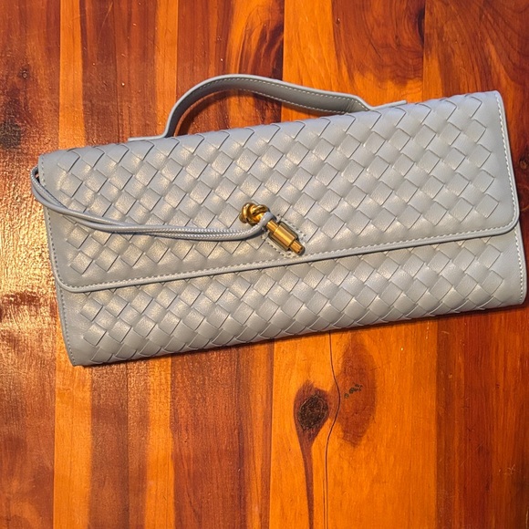 Elegant Blue Woven Clutch